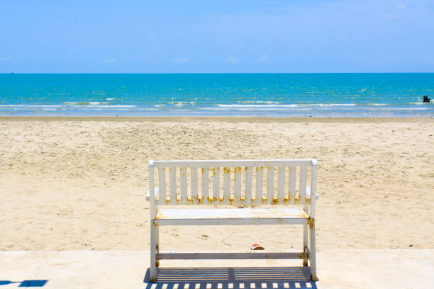 istock white chair seat set on beach 867972434