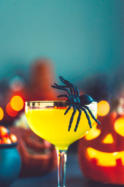 istock Halloween time. Vibrant cocktails with spider 867978958