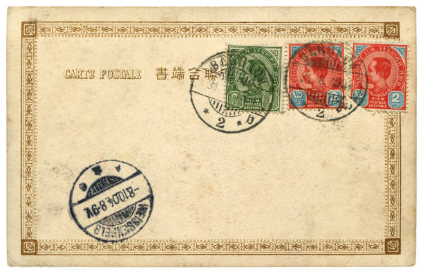 vintage postcard with postmarks and blank content sent from Bangkok, Thailand in 1907, a very good background for any usage of the Thai historic postcard communications. stock photo