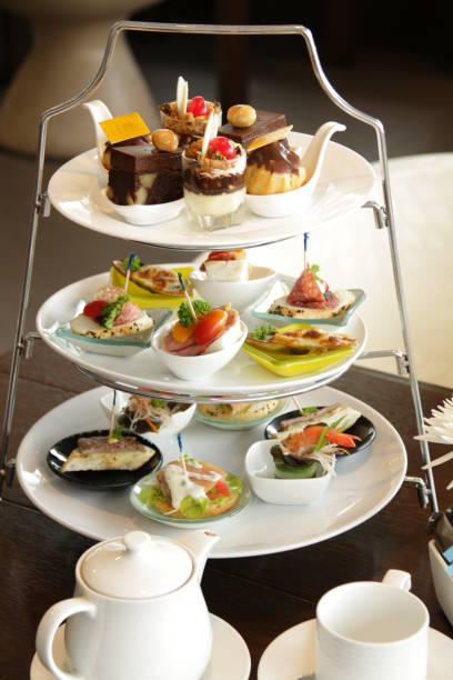 istock Afternoon tea served with an assortment of cake 867982534