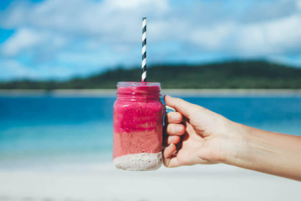 Fresh smoothie on the beach Smoothies on the beach Mentawai Islands stock pictures, royalty-free photos & images