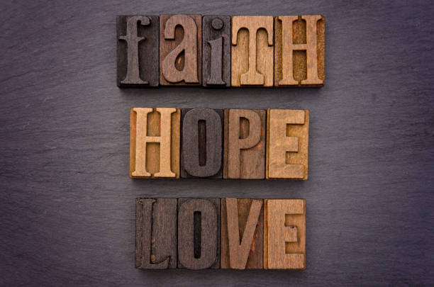 istock Faith, Hope, Love Spelled out in Type Set 867985074
