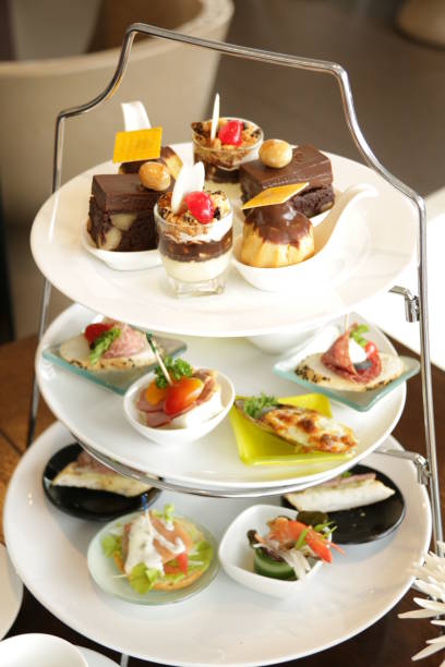 istock Afternoon tea served with an assortment of cake 867985860