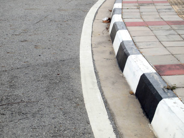 istock closeup of road with black and white line 867994500