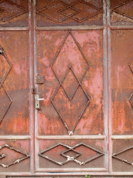 istock grungy metal surface and lock on rusty iron door 867994846
