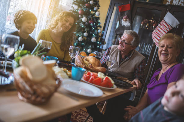 istock Family having Christmas dinner 868023034