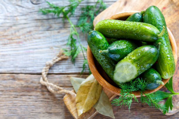istock Freshly salted cucumbers with spices and dill. 868026502
