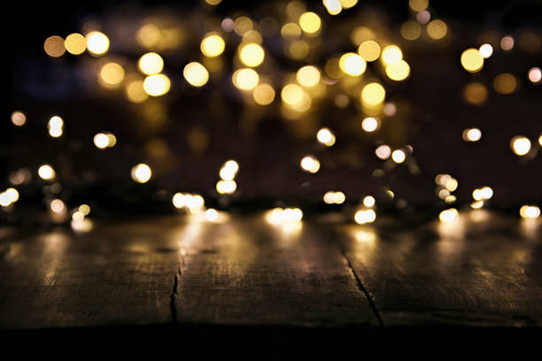 istock abstract blurred image of gold garland lights background. defocused. 868029278