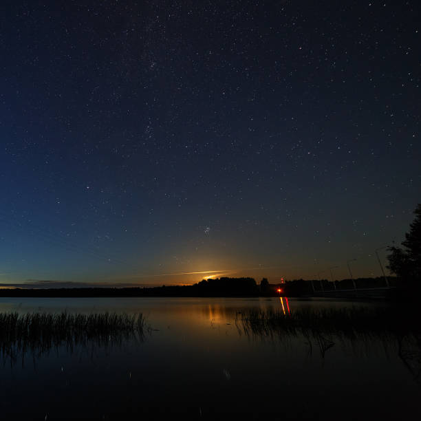 istock The stars in the night sky over the river. 868032786