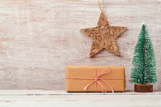 istock Christmas background with homemade gift box and rustic decorations 868033366