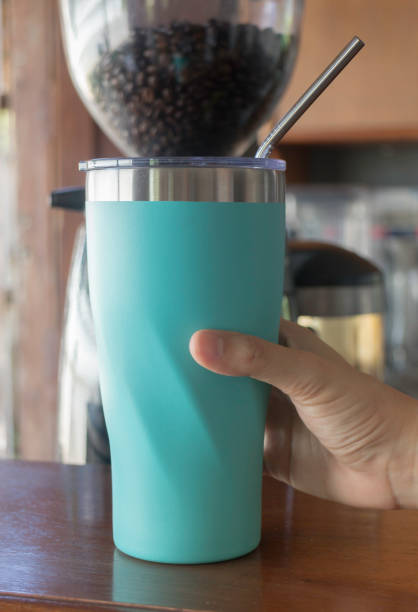 istock Hand holding coffee reuse glass 868036482