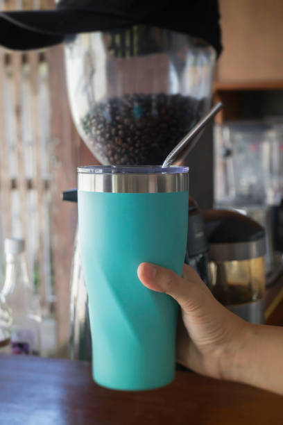 istock Hand holding coffee reuse glass 868036484