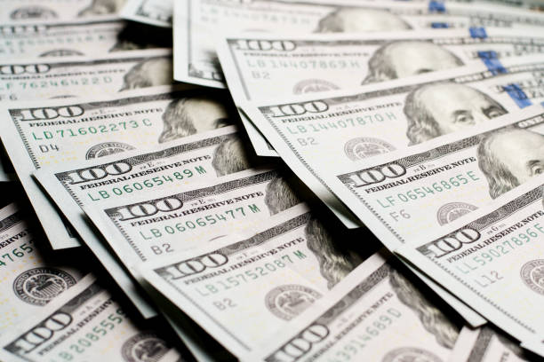 istock dollars lie in a fan 868048224