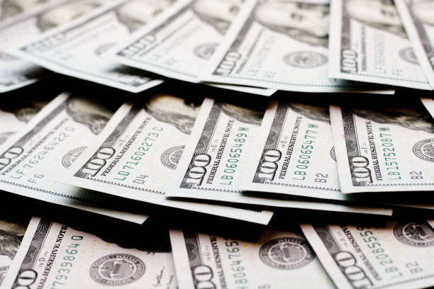 istock dollars lie in a fan 868048764