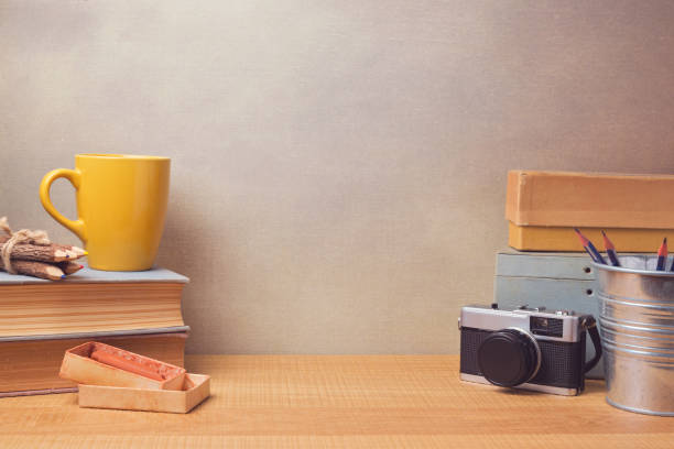 Vintage retro objects on wooden desk. Website hero image concept