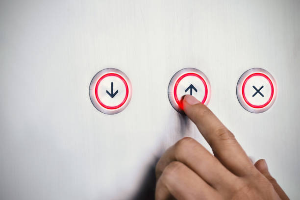 istock Hand push the button up with red light, business symbol concept 868053176
