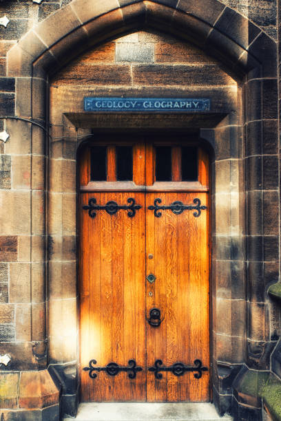 An Old Wooden Door At A College Of A Prestigious University Or School