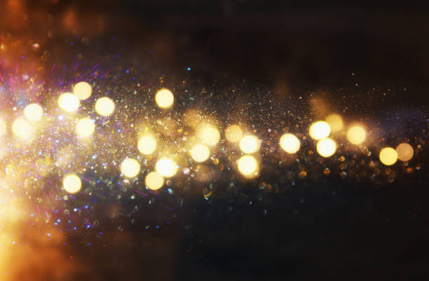 istock glitter vintage lights background. defocused. 868054632