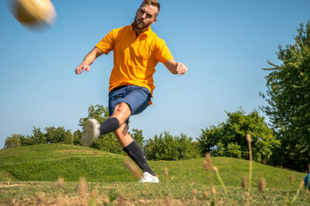 istock Footgolf Player Striking the Ball 868061126