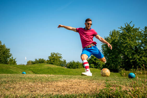 istock Footgolf Player Striking the Ball 868061130