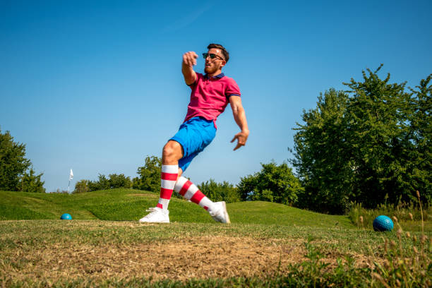 istock Footgolf Player Striking the Ball 868061138