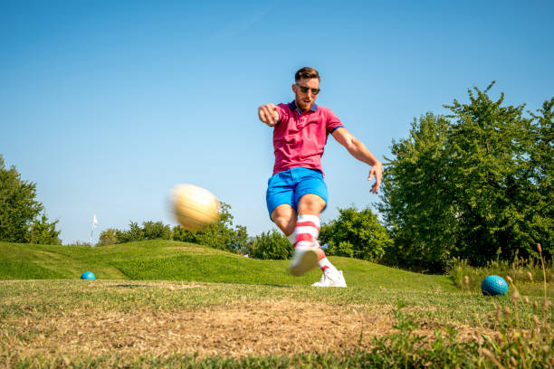 istock Footgolf Player Striking the Ball 868061140