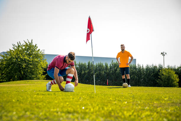 istock Two Sportsmen Playing Footgolf 868061148