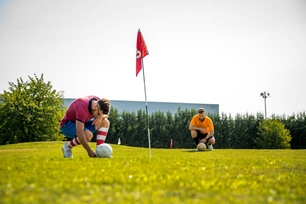 istock Two Sportsmen Playing Footgolf 868061150
