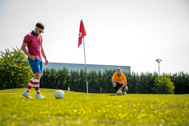 istock Two Sportsmen Playing Footgolf 868061154