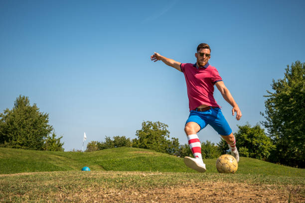 istock Footgolf Player Striking the Ball 868061158