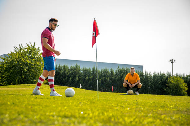 istock Two Sportsmen Playing Footgolf 868061192