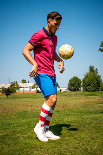 istock Footgolf Player Juggling with the Ball 868061210