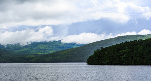 istock Lake George from the paddle boat during rain storm and clouds. 868065188