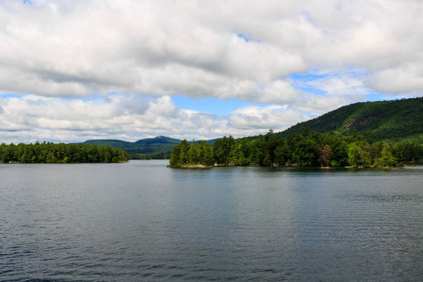 istock Lake George from the paddle boat during rain storm and clouds. 868065328