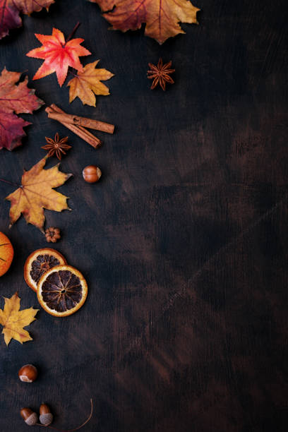 istock Autumn Background With Candied Oranges, Nuts and Spices 868070816