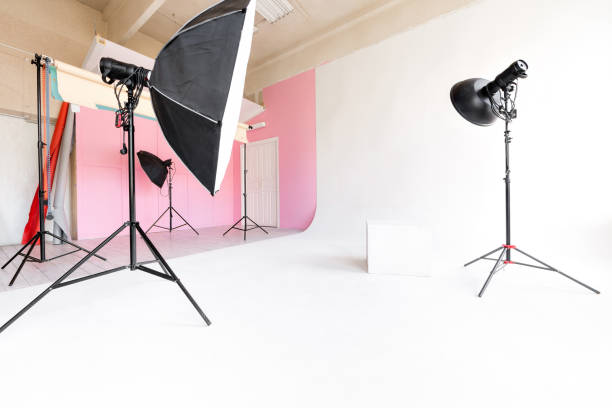 istock large studio space white cyclorama and natural light from large windows. lighting equipment and flash 868071170