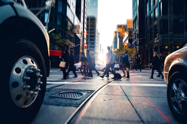 Photo of Crossing people - traffic at rush hour