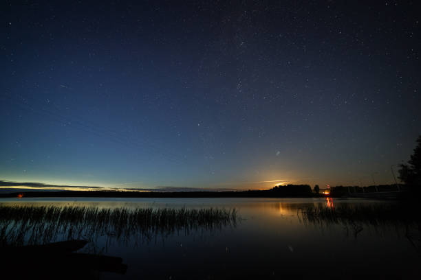 istock The stars in the night sky over the river. 868079266