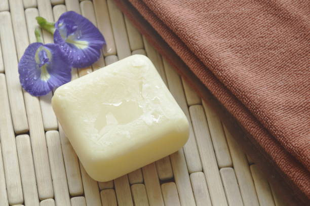istock soap and towel with butterfly pea on bamboo mat 868086642