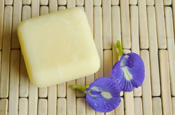istock soap and butterfly pea on bamboo mat 868086658