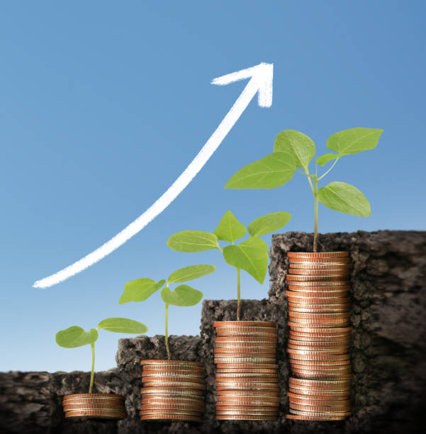 istock Coins graph stock market 868086788