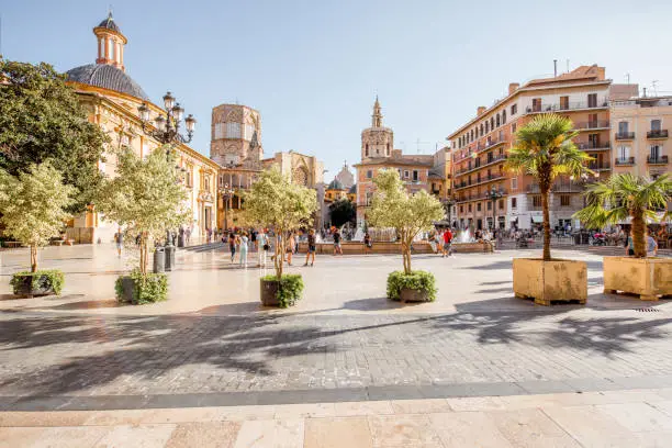 View in the Virgen square with cathedral in the centre of Valencia city during the sunny day in Spain