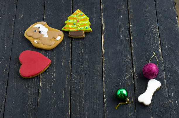 istock A dog, a red heart and a bone. New Year's composition. Front view. 868088396