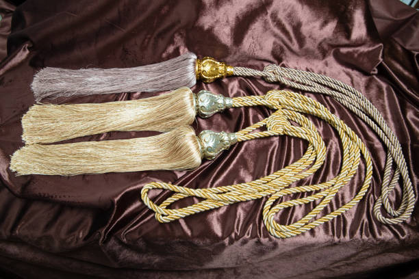 istock Beautiful Curtains tassel by curtain strap with sunlight for interior luxury house, Selective focus 868091404