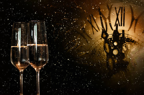 istock Night sky with clock and champagne for new year 868094376
