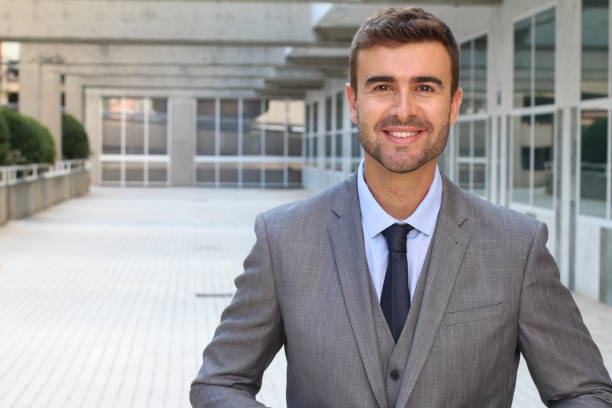istock Good looking businessman isolated in office space 868096008