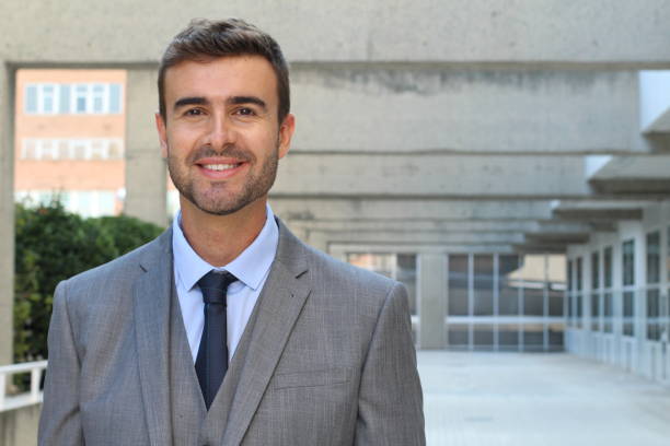 istock Good looking businessman isolated in office space 868096022