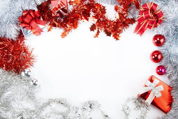 istock Christmas tinsels with isolated white space 868098214