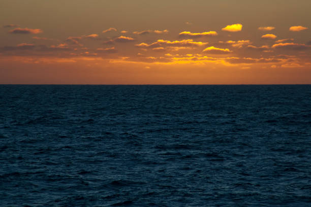 istock Sunset over the Antarctic ocean 868102574