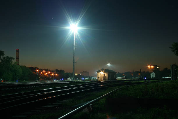 istock Railway junction in Moscow by a summer night with powerful floodlights. 868105656